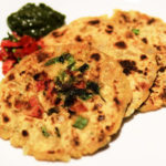 gluten free corn meal flat bread with tomatoes, onions and spices, pyaaz tamatar ka tikkad