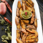 curry spiced oven roasted potatoes, homemade potato wedges